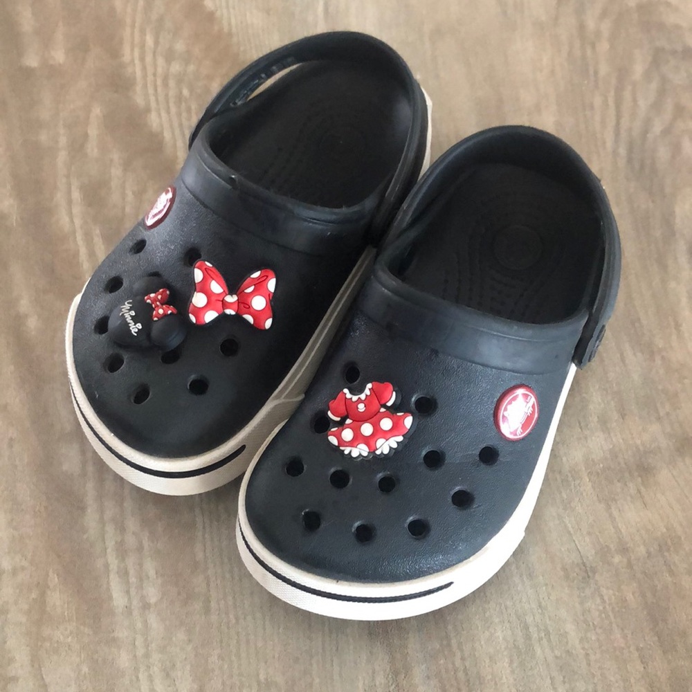 Gently used crocs with Minnie buttons